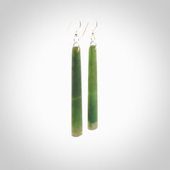 Hand carved New Zealand Jade drop earrings. Hand made drop earrings with sterling silver. Hand carved New Zealand Jade drop earrings by Rueben Tipene. Delivered in a woven kete pouch.