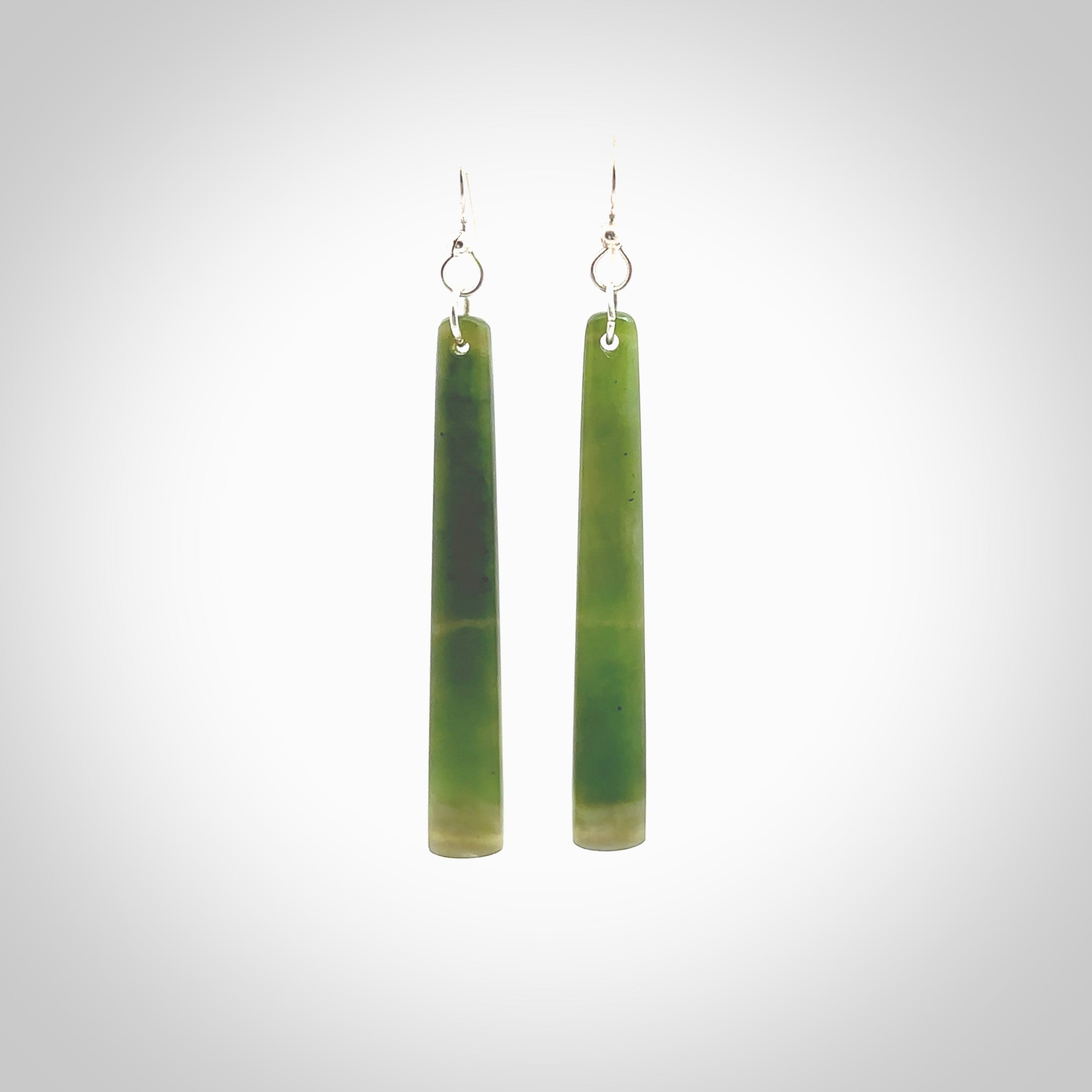 Hand carved New Zealand Jade drop earrings. Hand made drop earrings with sterling silver. Hand carved New Zealand Jade drop earrings by Rueben Tipene. Delivered in a woven kete pouch.