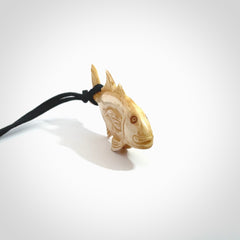 Hand carved stained bone fish pendant. Hand made stained bone fish necklace. Fish themed jewellery. Ocean themed pendant. Bone fish necklace provided with adjustable cord and free delivery.