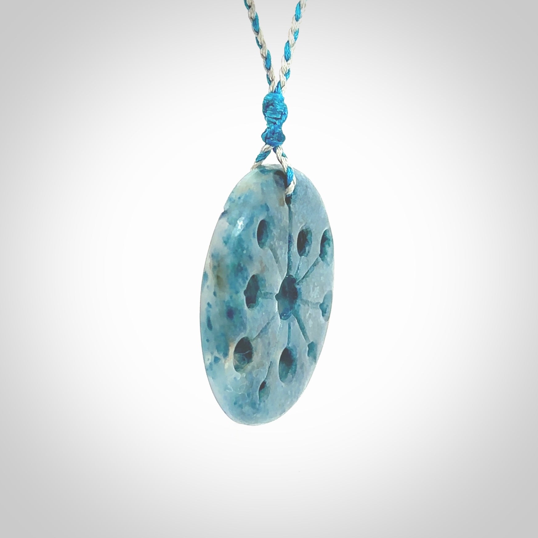 This is a handcrafted aotea stone disc pendant. This is a solid contemporary work of art. We ship this worldwide express courier and are happy to answer any questions that you may have about these or other products on our website. Hand made by Ana Krakosky.