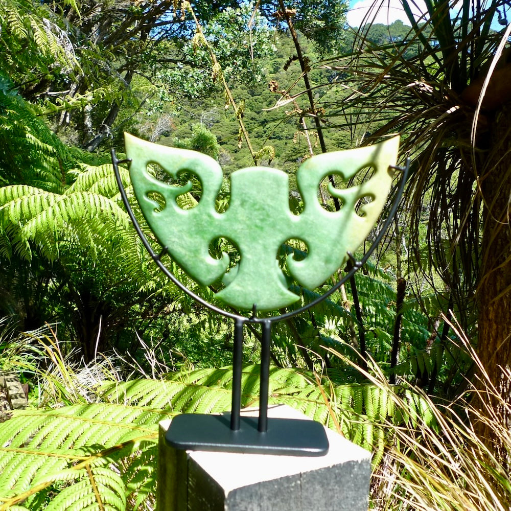 A hand carved New Zealand Jade owl sculpture with Paua shell eyes. A large sized hand made ruru, owl, sculpture by New Zealand artist Kerry Thompson. One off work of art to display.