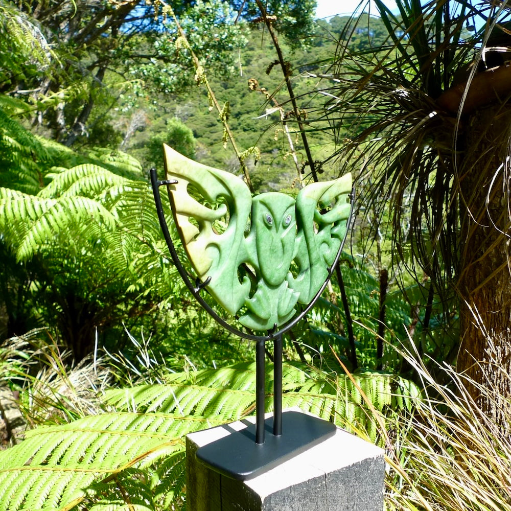 A hand carved New Zealand Jade owl sculpture with Paua shell eyes. A large sized hand made ruru, owl, sculpture by New Zealand artist Kerry Thompson. One off work of art to display.