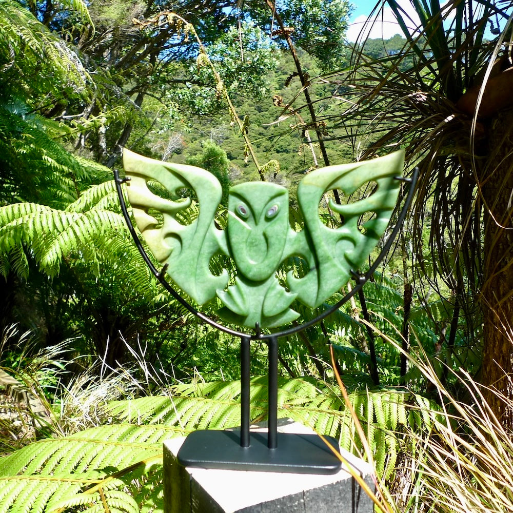 A hand carved New Zealand Jade owl sculpture with Paua shell eyes. A large sized hand made ruru, owl, sculpture by New Zealand artist Kerry Thompson. One off work of art to display.