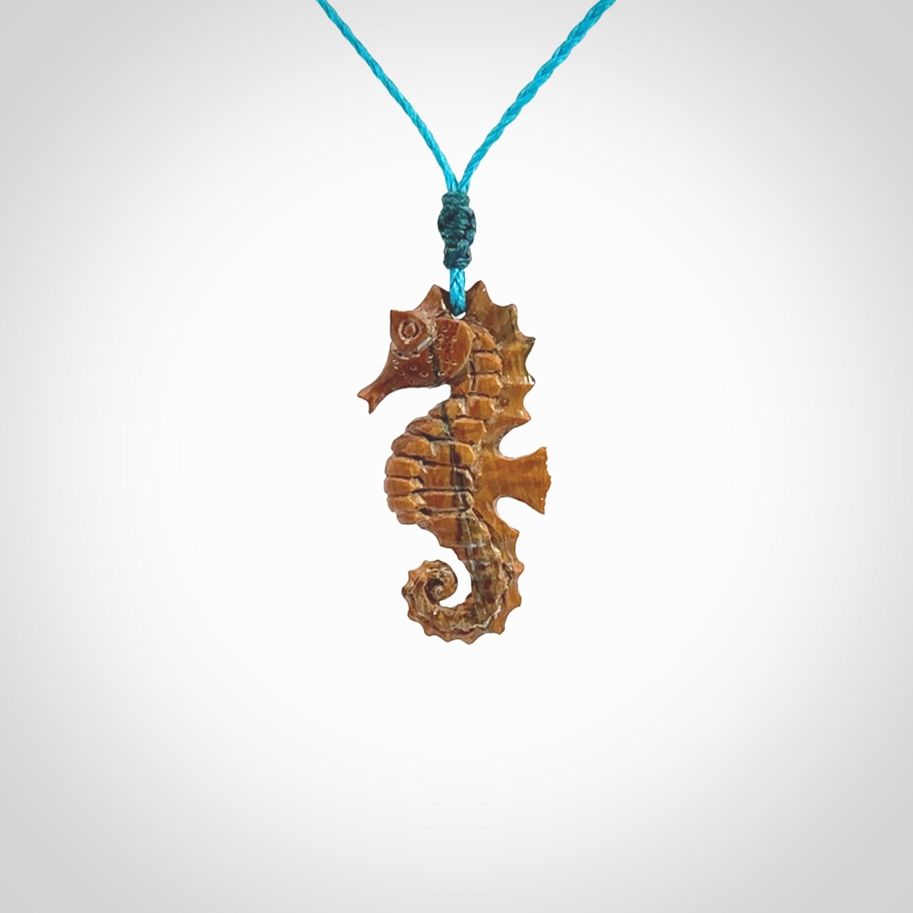 This little pendant is a beautifully carved seahorse pendant made from ancient woolly mammoth tusk. We have designed this so that it can be worn as a pendant, or as a little charm. Made by NZ Pacific and for sale worldwide on our website. Free Postage wherever you are.