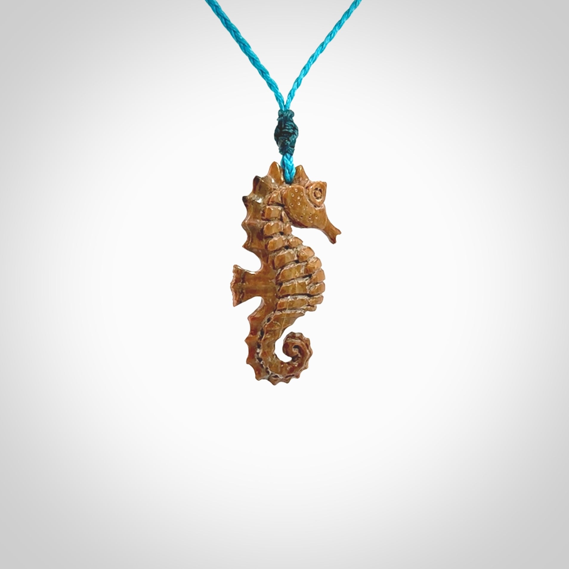 This little pendant is a beautifully carved seahorse pendant made from ancient woolly mammoth tusk. We have designed this so that it can be worn as a pendant, or as a little charm. Made by NZ Pacific and for sale worldwide on our website. Free Postage wherever you are.