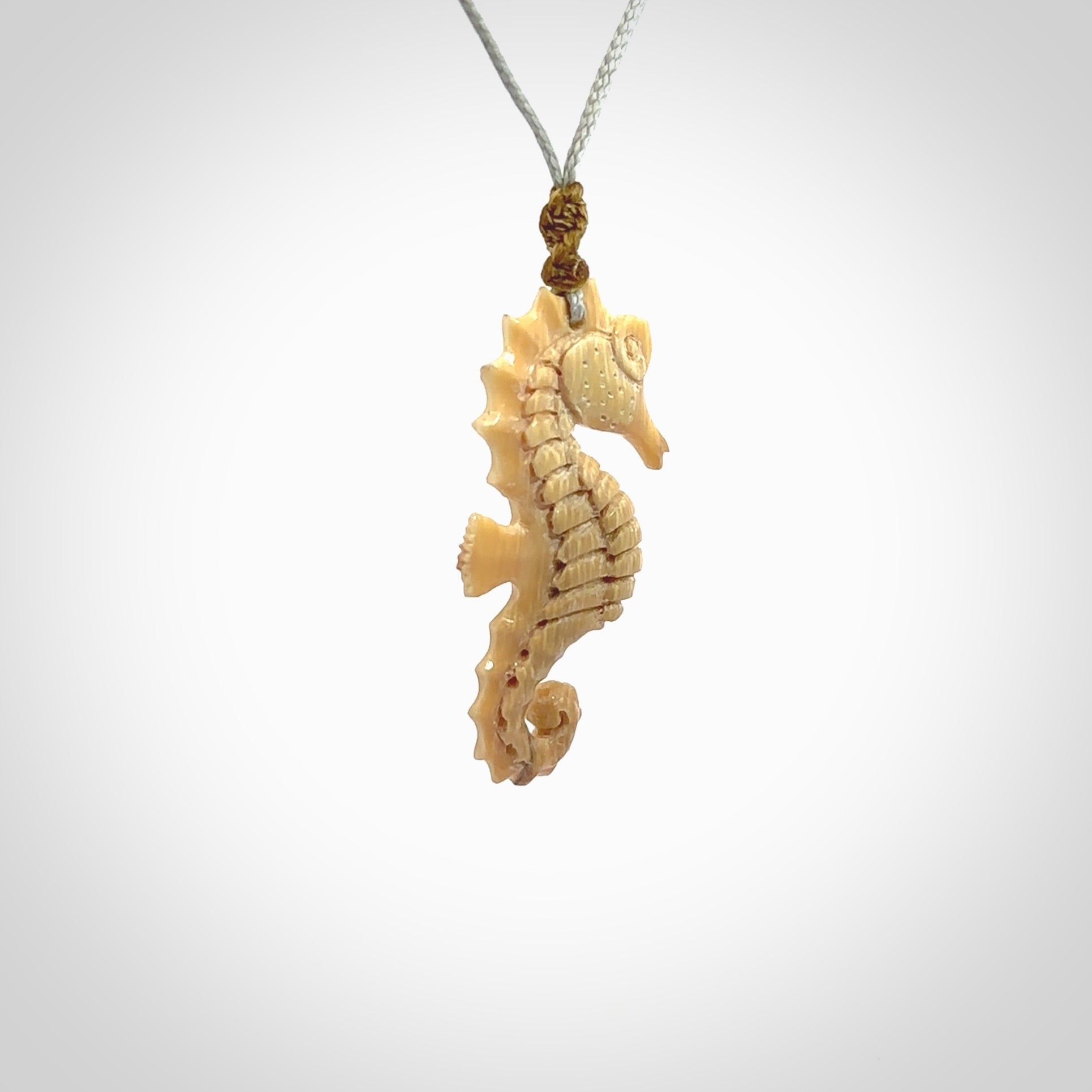 This little pendant is a beautifully carved seahorse pendant made from ancient woolly mammoth tusk. We have designed this so that it can be worn as a pendant, or as a little charm. Made by NZ Pacific and for sale worldwide on our website. Free Postage wherever you are.