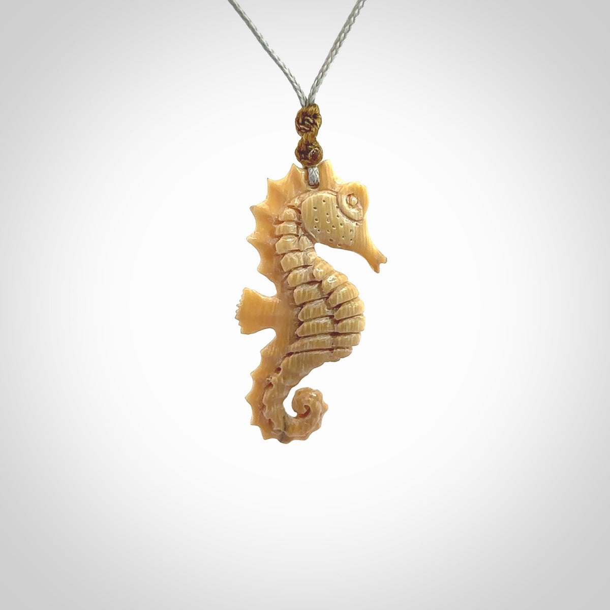 This little pendant is a beautifully carved seahorse pendant made from ancient woolly mammoth tusk. We have designed this so that it can be worn as a pendant, or as a little charm. Made by NZ Pacific and for sale worldwide on our website. Free Postage wherever you are.