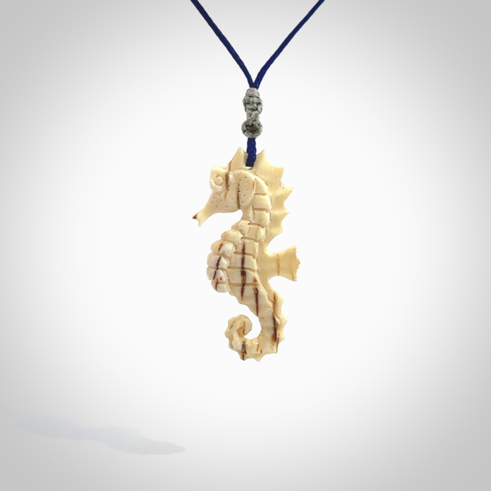 This little pendant is a beautifully carved seahorse pendant made from ancient woolly mammoth tusk. We have designed this so that it can be worn as a pendant, or as a little charm. Made by NZ Pacific and for sale worldwide on our website. Free Postage wherever you are.