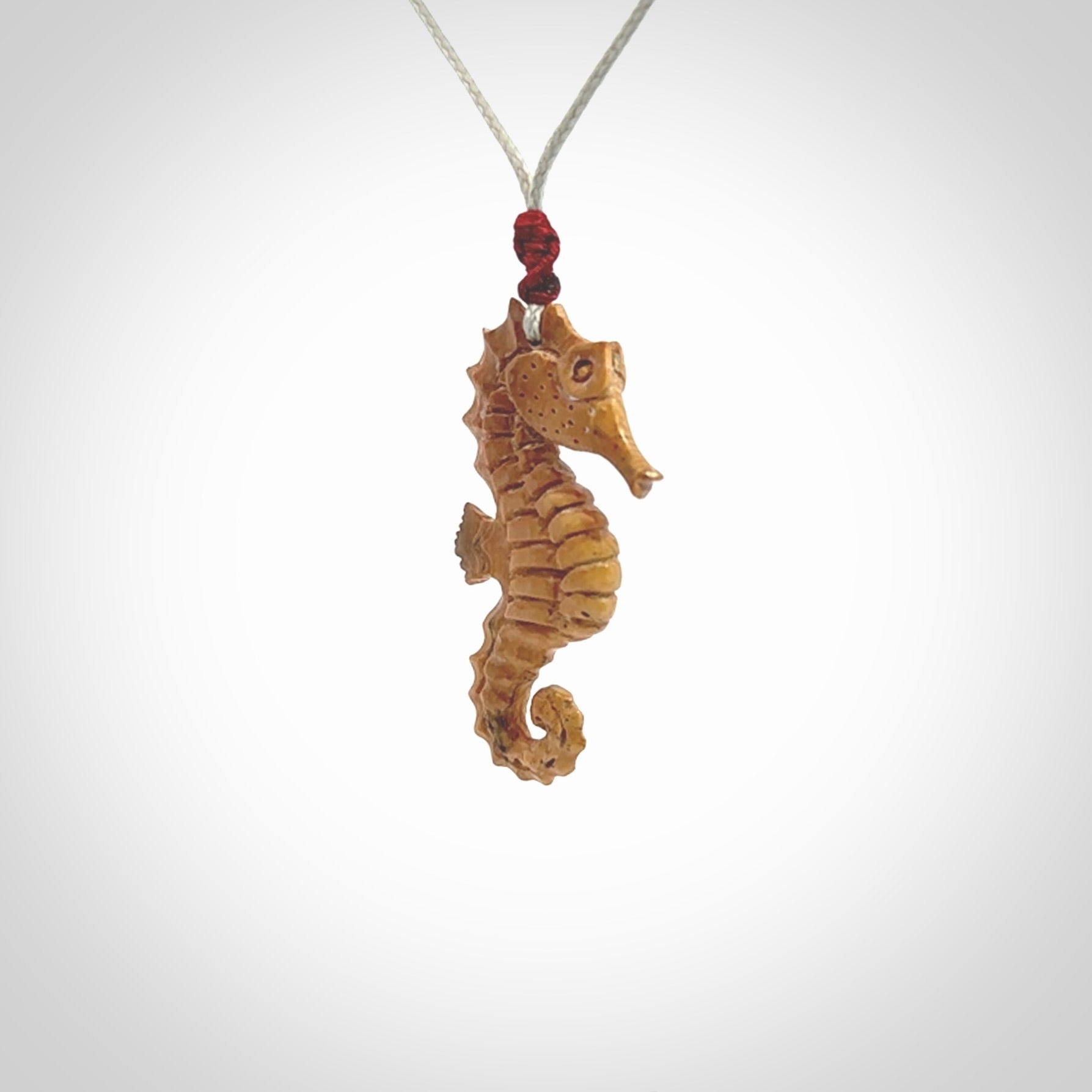 This little pendant is a beautifully carved seahorse pendant made from ancient woolly mammoth tusk. We have designed this so that it can be worn as a pendant, or as a little charm. Made by NZ Pacific and for sale worldwide on our website. Free Postage wherever you are.