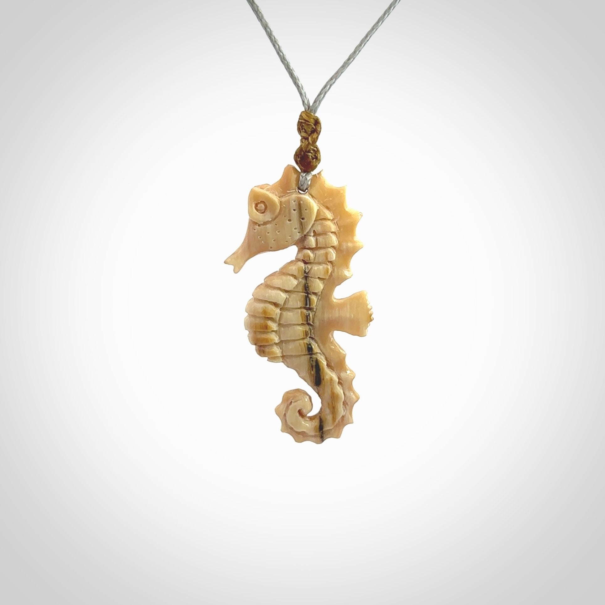 This little pendant is a beautifully carved seahorse pendant made from ancient woolly mammoth tusk. We have designed this so that it can be worn as a pendant, or as a little charm. Made by NZ Pacific and for sale worldwide on our website. Free Postage wherever you are.