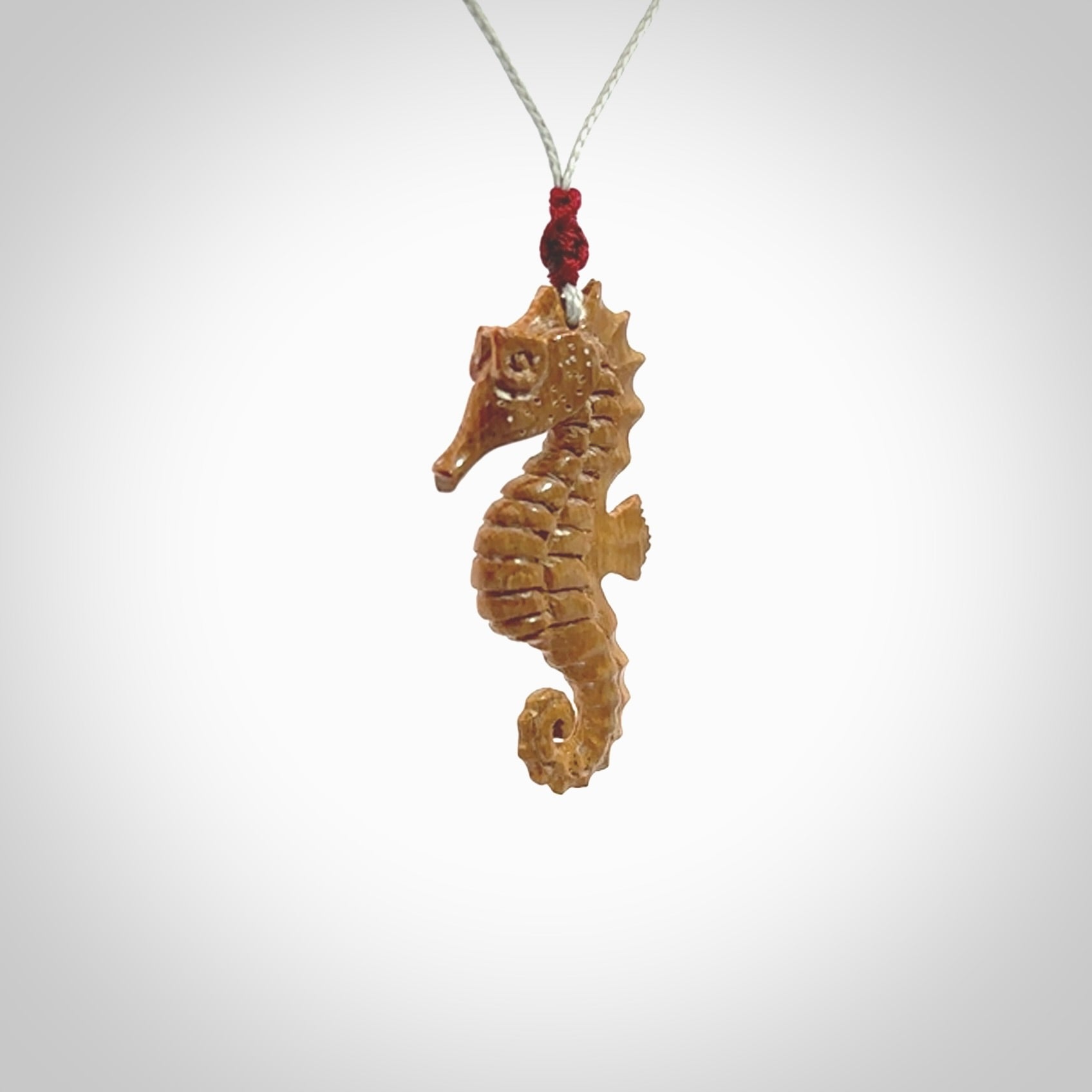 This little pendant is a beautifully carved seahorse pendant made from ancient woolly mammoth tusk. We have designed this so that it can be worn as a pendant, or as a little charm. Made by NZ Pacific and for sale worldwide on our website. Free Postage wherever you are.