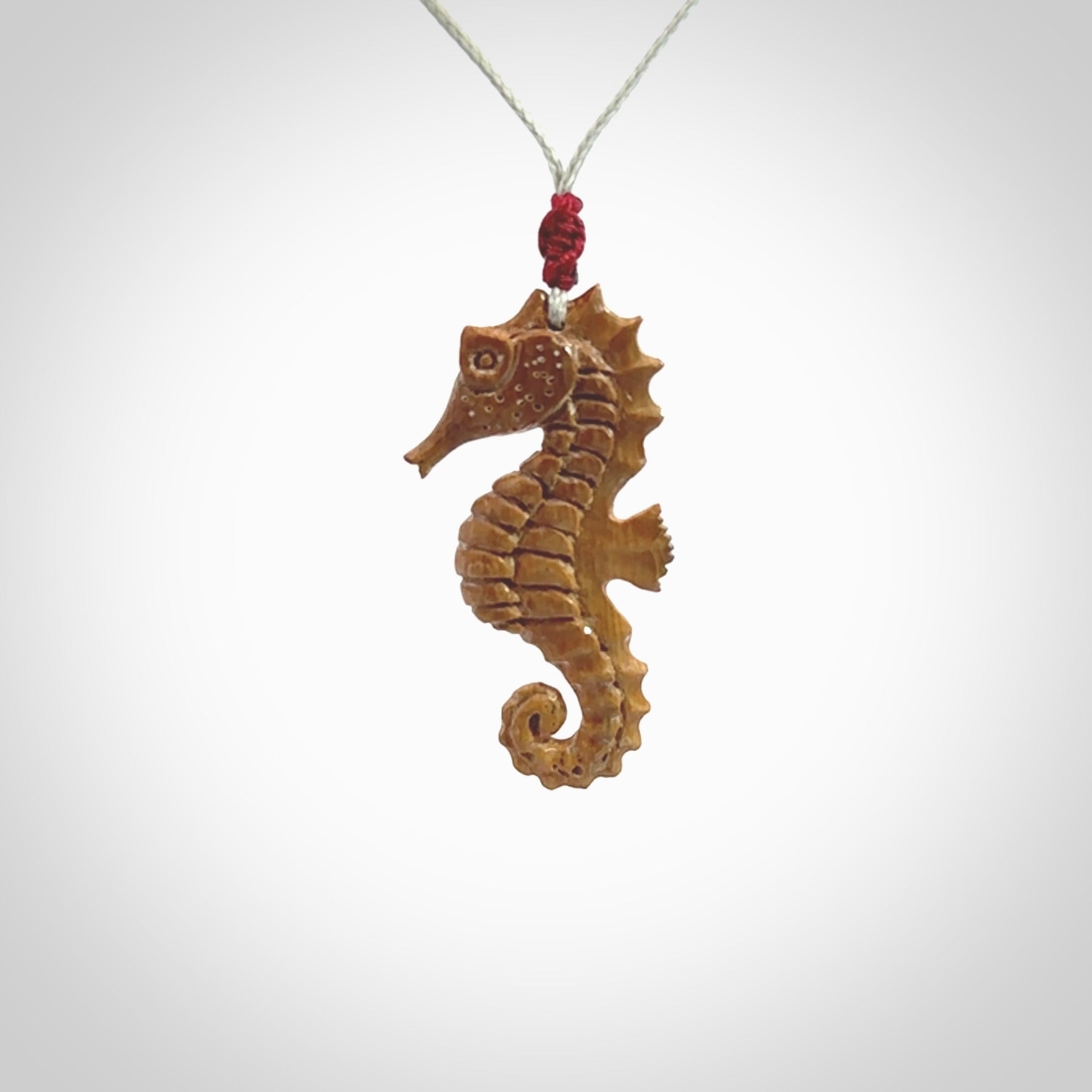 This little pendant is a beautifully carved seahorse pendant made from ancient woolly mammoth tusk. We have designed this so that it can be worn as a pendant, or as a little charm. Made by NZ Pacific and for sale worldwide on our website. Free Postage wherever you are.