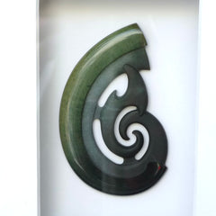 A hand carved large New Zealand Jade koru necklace that has been framed and signed by artist Kerry Thompson. A large sized hand made koru necklace by New Zealand artist Kerry Thompson. One off framed work of art to wear. Delivered with Express Courier.