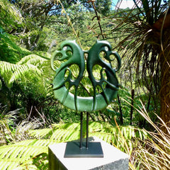 A hand carved New Zealand Jade Pekapeka sculpture with Paua shell eyes. A large sized hand made pekapeka, bat, sculpture by New Zealand artist Kerry Thompson. One off work of art to display.