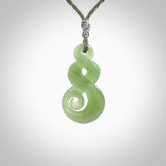 A beautiful carved, complex double twist pendant. This piece has been carved for us by Ross Crump and is a truly beautiful carving made from some of our finest and rarest Inanga jade. We will ship this to you with an express courier so you will have it quickly. A rare and beautiful work of wearable art from NZ Pacific.