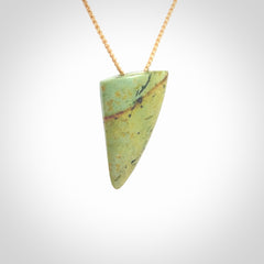 Hand carved pounamu drop pendant. Jade necklace hand made in New Zealand. A contemporary drop pendant carved from rare New Zealand flower jade. NZ Pacific jade jewellery for sale online.