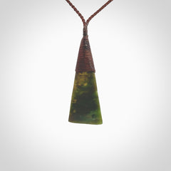 Hand carved pounamu drop pendant. Flower Jade necklace hand made in New Zealand. A drop pendant carved from rare New Zealand Flower jade. NZ Pacific jade jewellery for sale online.