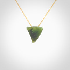 Hand carved small jade niho, fang, pendant. Carved by New Zealand artist Ric Moor. Contemporary New Zealand Jade fang, drop necklace. One only unique pendant for men and women.