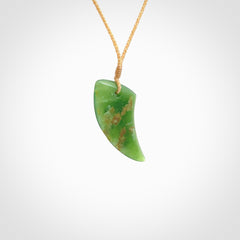 Hand carved medium sized pounamu drop pendant by Ric Moor. Jade drop necklace hand made in New Zealand. A contemporary drop pendant carved from rare New Zealand jade. NZ Pacific jade jewellery for sale online. One only, packaged in a woven kete pouch. Provided with a beige adjustable cord.