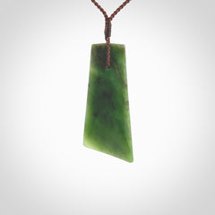 One only large New Zealand jade drop pendant. Hand carved in New Zealand by Ric Moor, jade artist, for NZ Pacific.