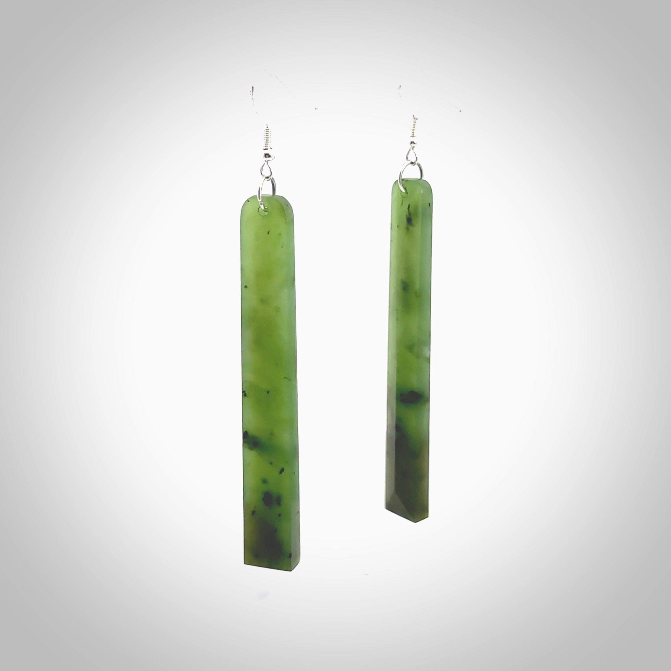 Hand carved New Zealand Jade drop earrings. Hand made large drop earrings with sterling silver. Hand carved New Zealand Jade drop earrings by Rueben Tipene. Delivered in a woven kete pouch.