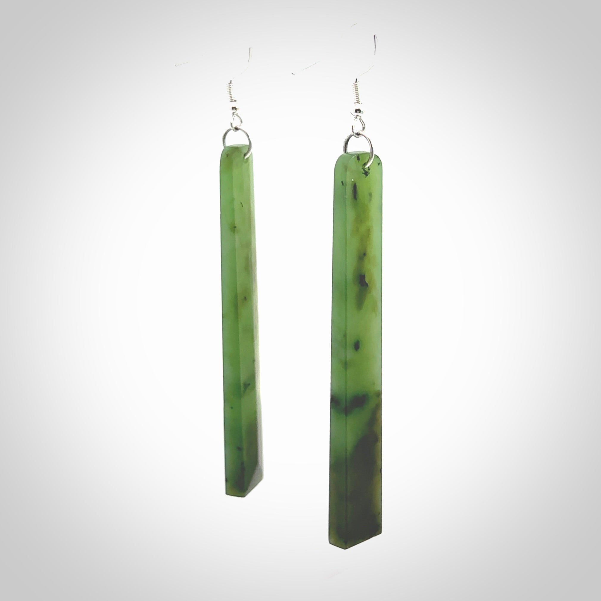 Hand carved New Zealand Jade drop earrings. Hand made large drop earrings with sterling silver. Hand carved New Zealand Jade drop earrings by Rueben Tipene. Delivered in a woven kete pouch.