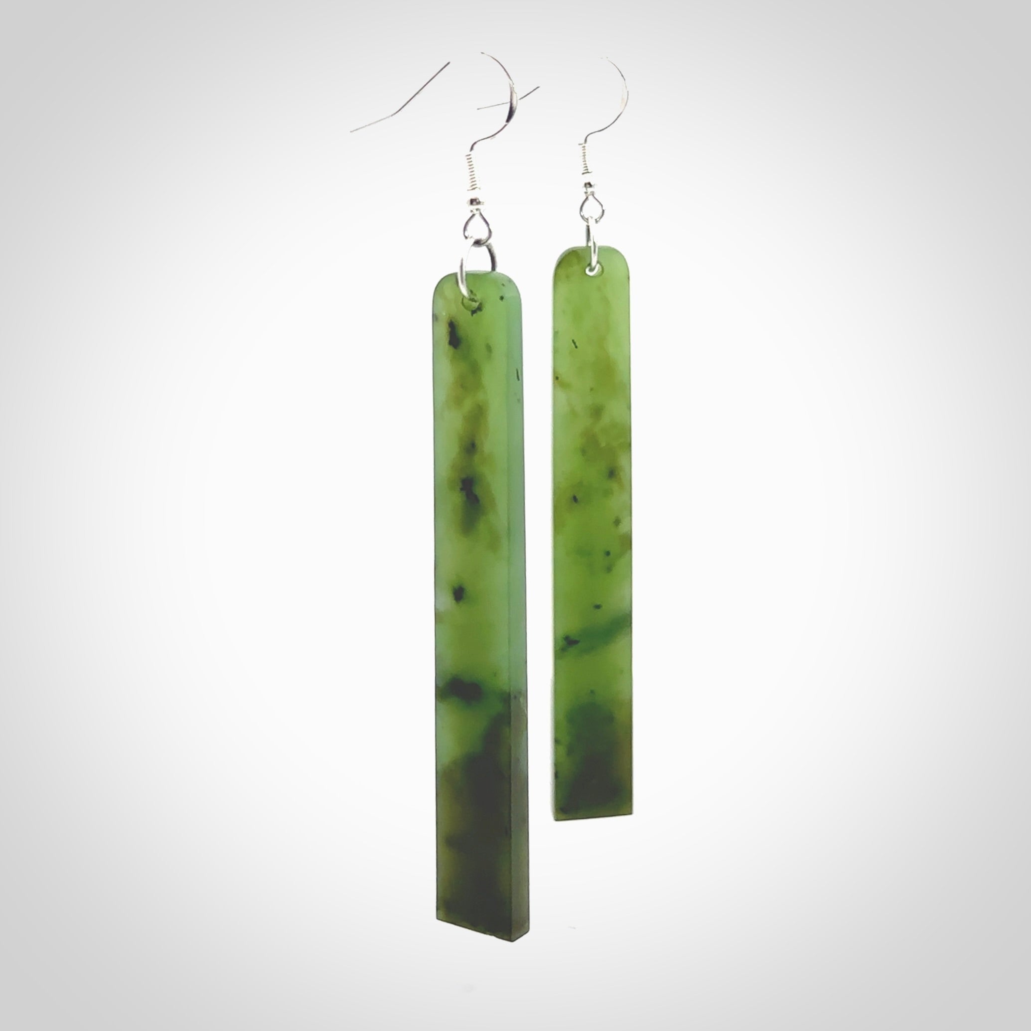 Hand carved New Zealand Jade drop earrings. Hand made large drop earrings with sterling silver. Hand carved New Zealand Jade drop earrings by Rueben Tipene. Delivered in a woven kete pouch.