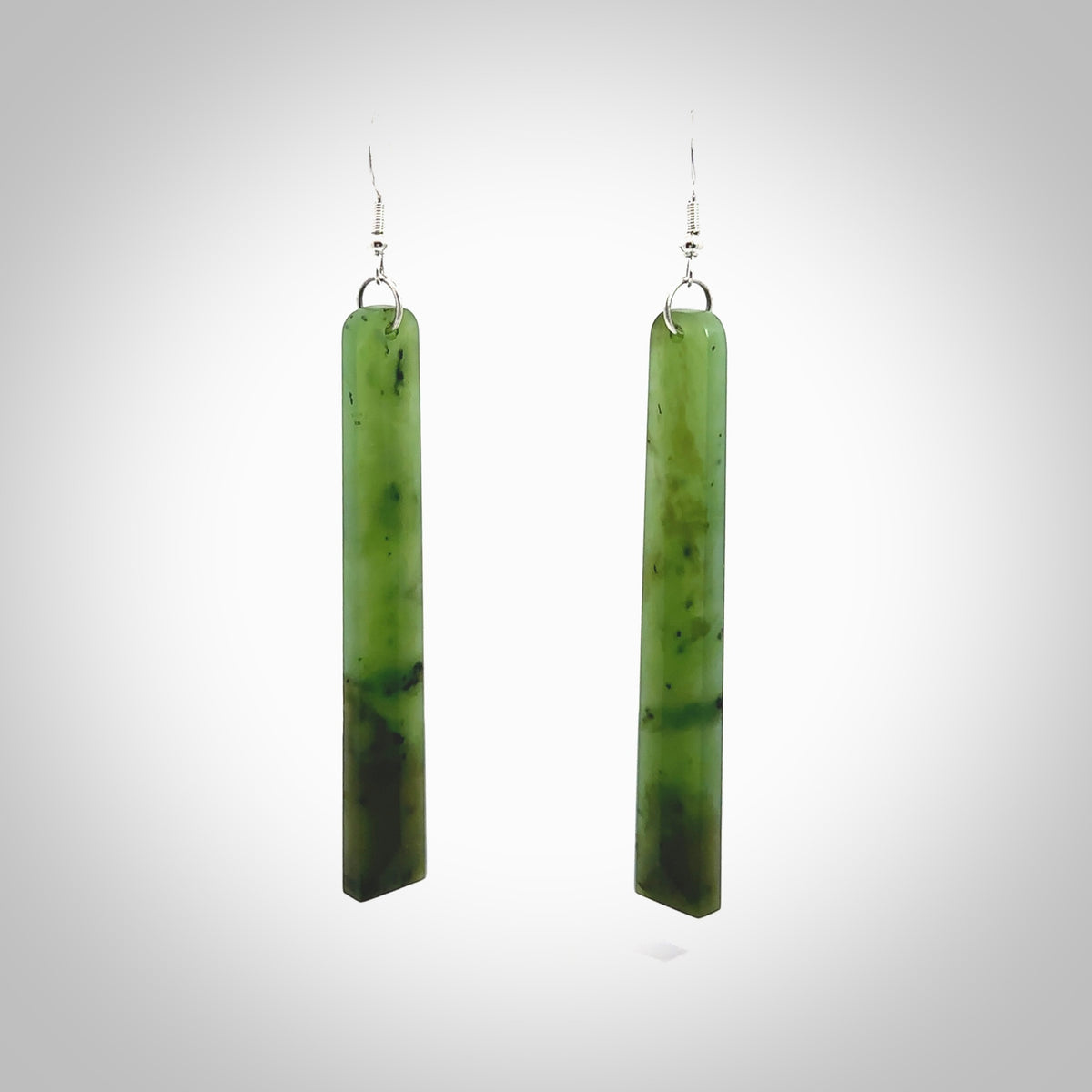 Hand carved New Zealand Jade drop earrings. Hand made large drop earrings with sterling silver. Hand carved New Zealand Jade drop earrings by Rueben Tipene. Delivered in a woven kete pouch.