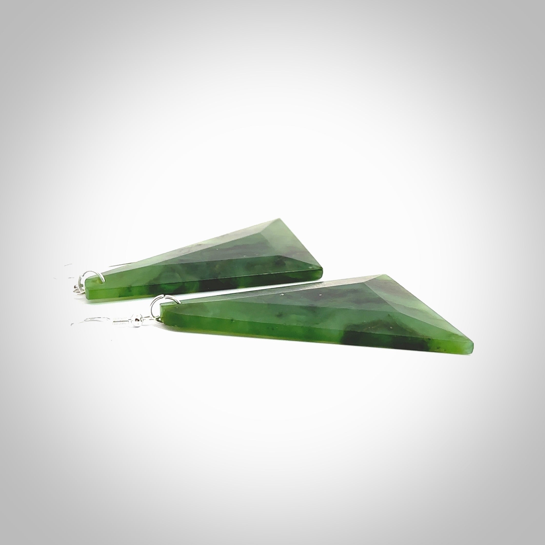 Hand carved New Zealand Jade drop earrings. Hand made large drop earrings with sterling silver. Hand carved New Zealand Jade drop earrings by Rueben Tipene. Delivered in a woven kete pouch.