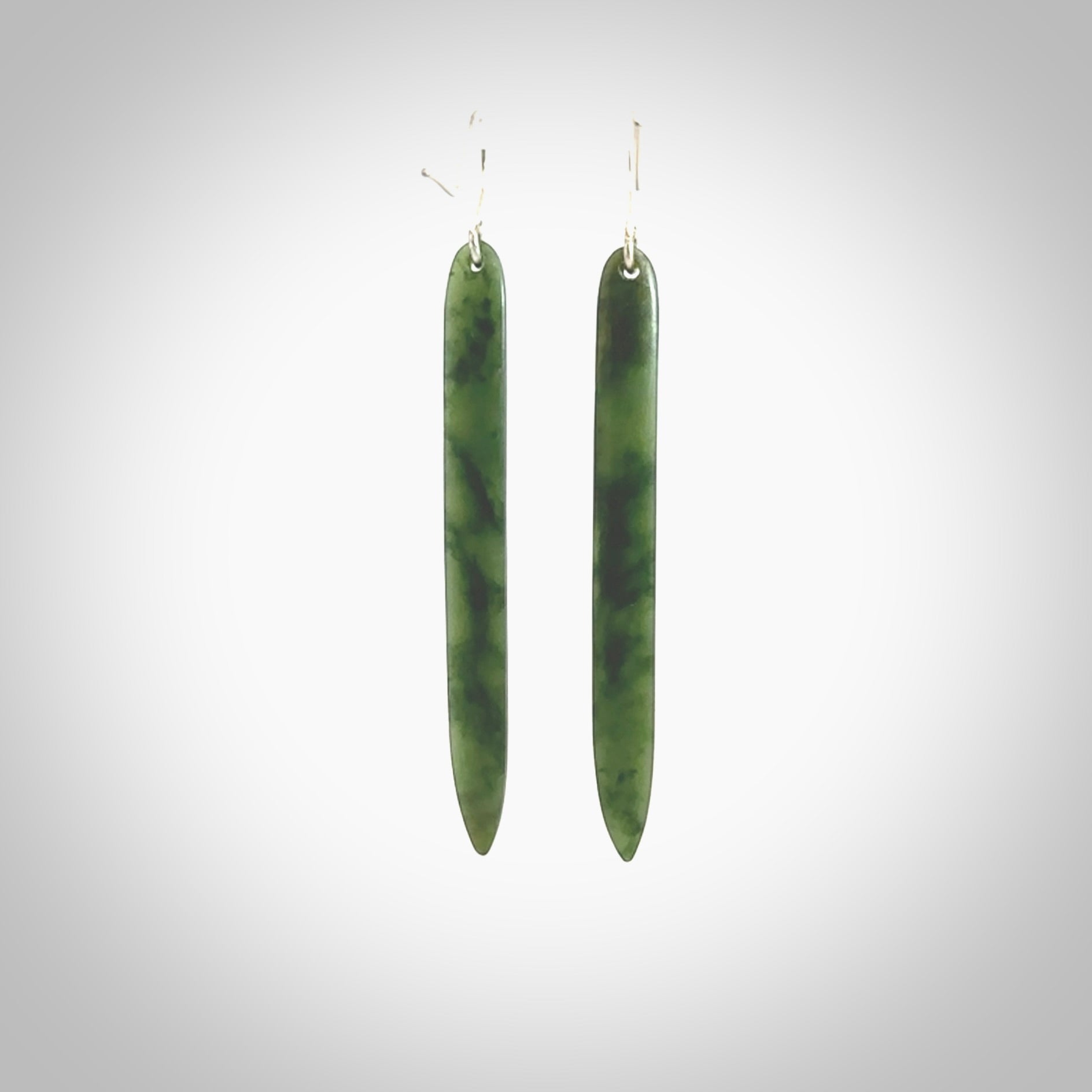 Hand carved large New Zealand jade drop earrings. Made by NZ Pacific from real jade. Online jewellery for sale online by NZ Pacific. Large sized Jade drop earrings hand carved by New Zealand carver Ric Moor.