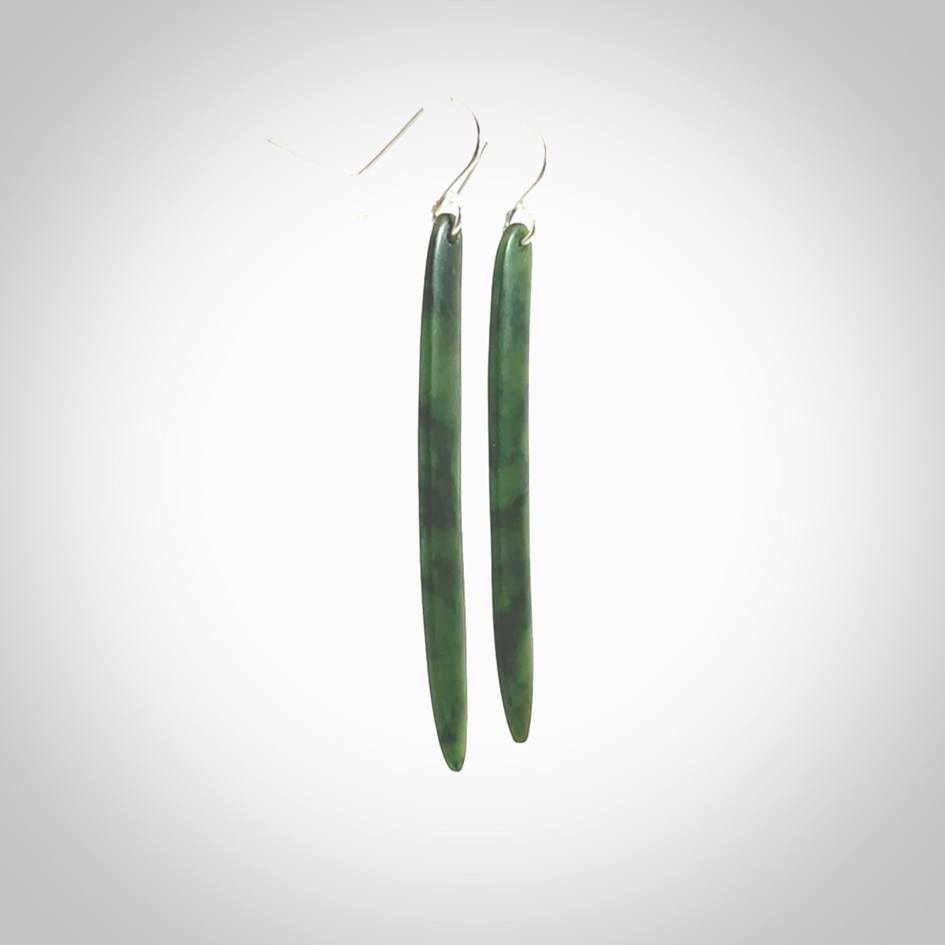 Hand carved large New Zealand jade drop earrings. Made by NZ Pacific from real jade. Online jewellery for sale online by NZ Pacific. Large sized Jade drop earrings hand carved by New Zealand carver Ric Moor.