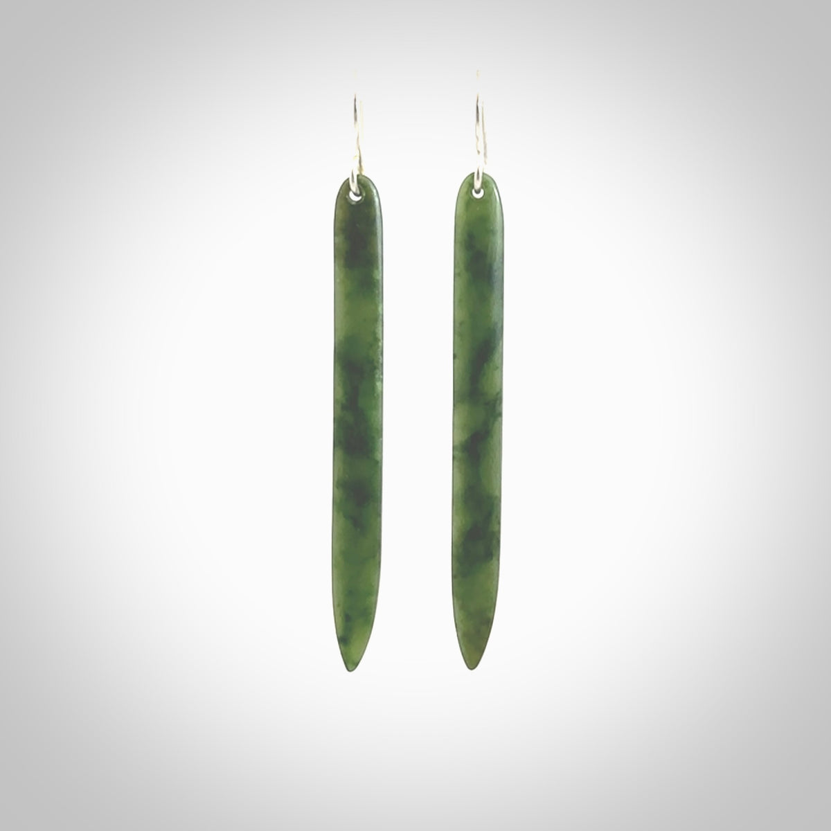 Hand carved large New Zealand jade drop earrings. Made by NZ Pacific from real jade. Online jewellery for sale online by NZ Pacific. Large sized Jade drop earrings hand carved by New Zealand carver Ric Moor.