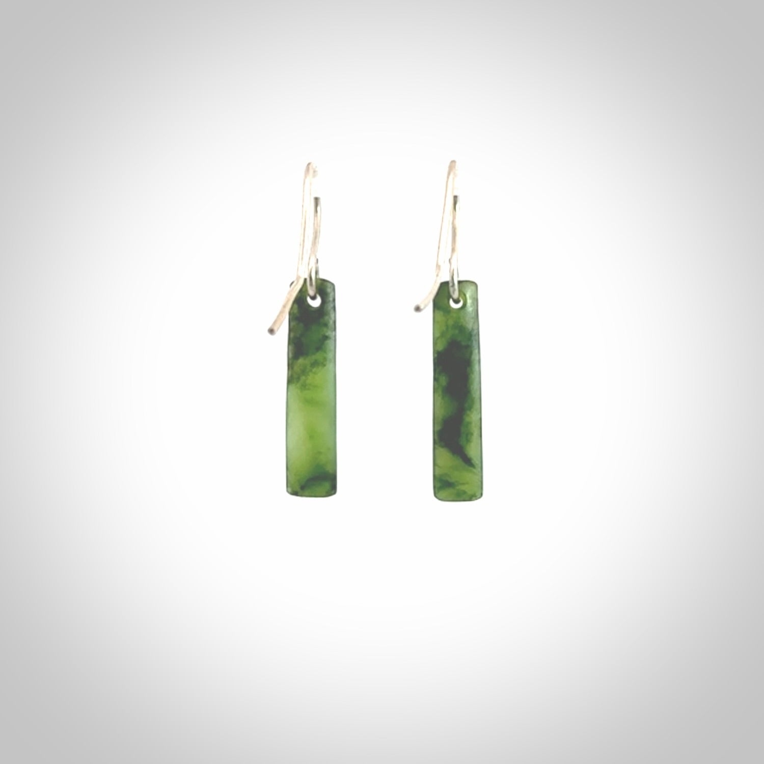 Hand carved small sized New Zealand jade drop earrings. Made by NZ Pacific from real jade. Online jewellery for sale online by NZ Pacific. Medium sized Jade drop earrings hand carved by New Zealand carver Ric Moor.