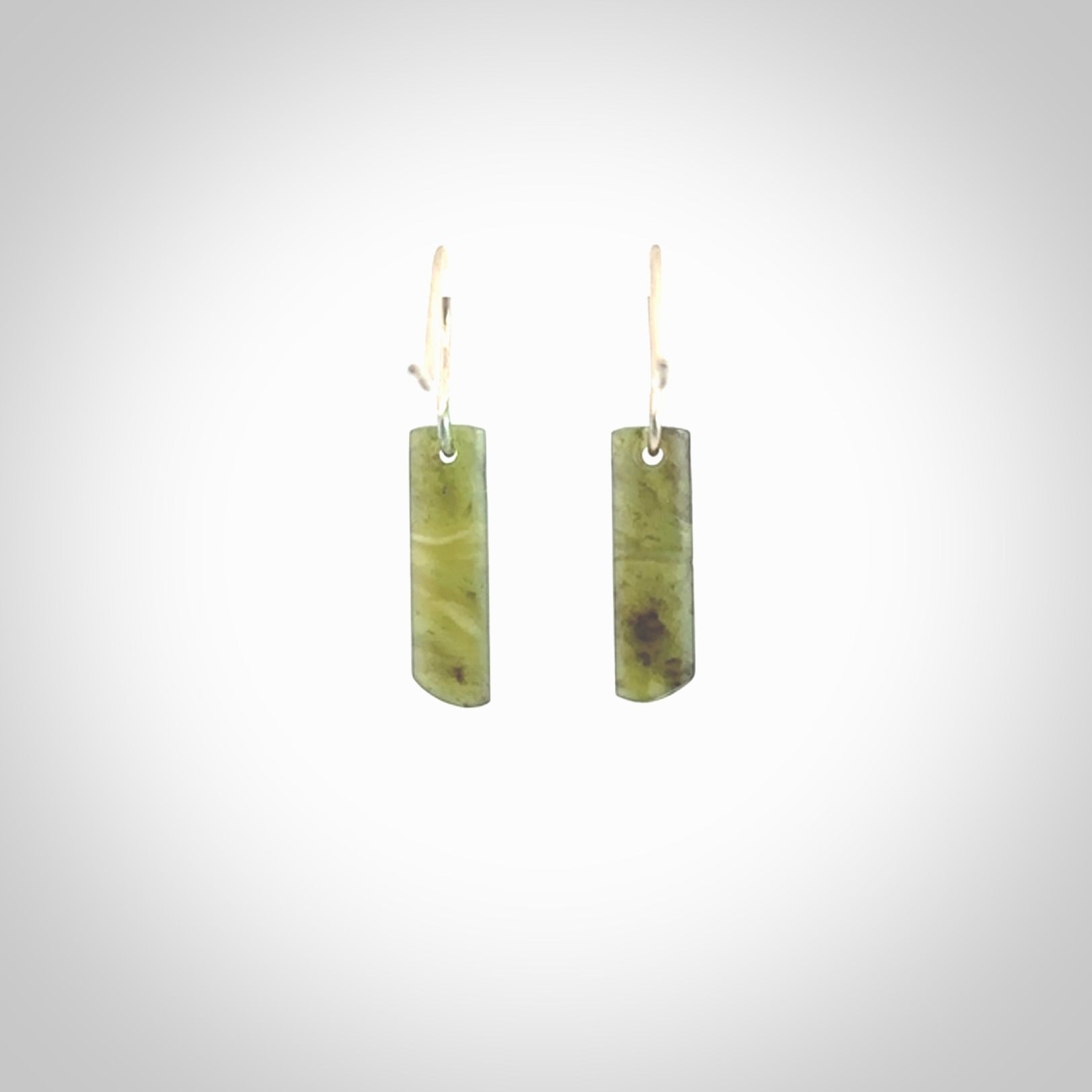 Hand carved small New Zealand jade drop earrings. Made by NZ Pacific from real jade. Online jewellery for sale online by NZ Pacific. Hand carved here in New Zealand by Ric Moor.