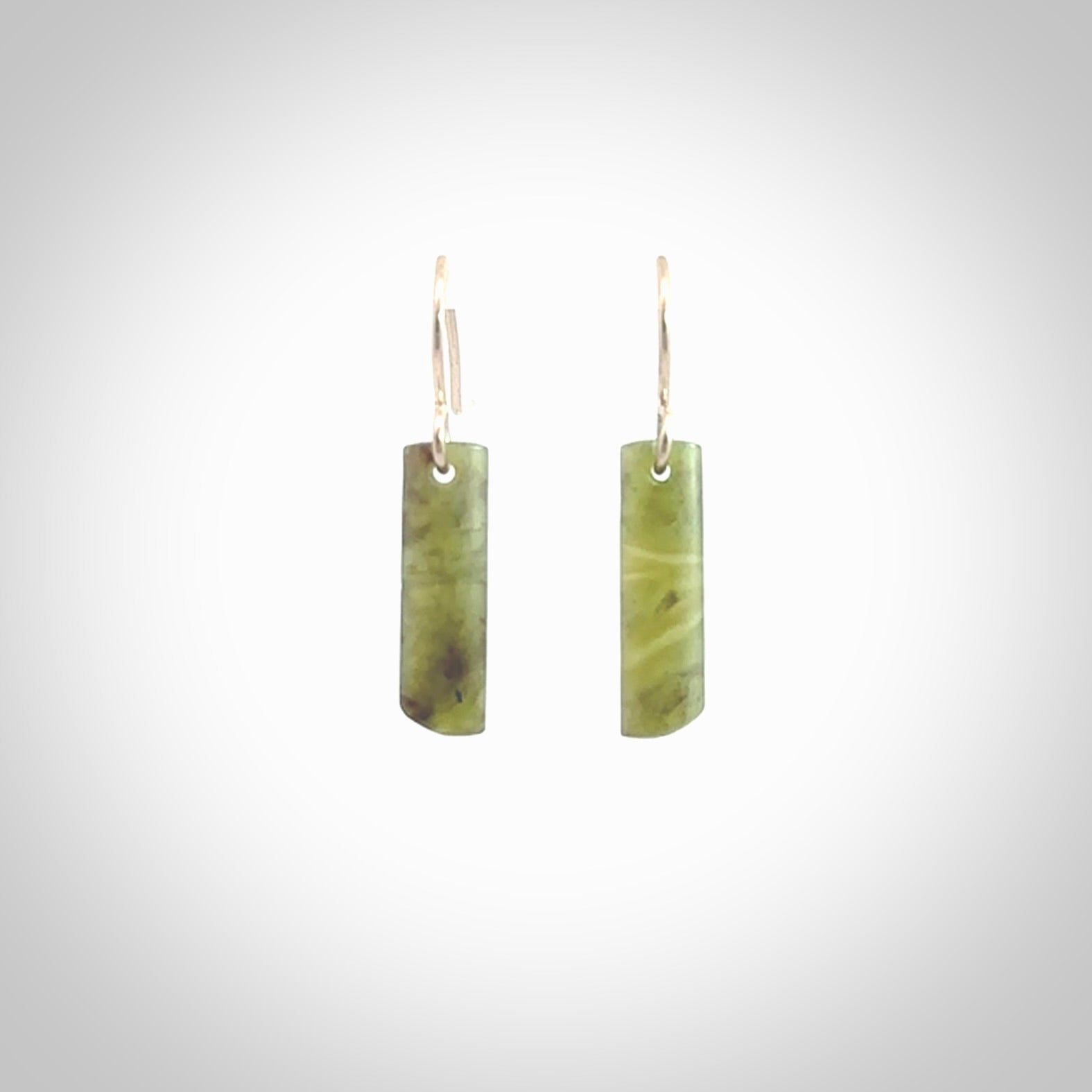 Hand carved small New Zealand jade drop earrings. Made by NZ Pacific from real jade. Online jewellery for sale online by NZ Pacific. Hand carved here in New Zealand by Ric Moor.