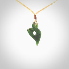 Hand carved small sized, New Zealand jade twist pendant. Carved in New Zealand by NZ Pacific. Hand made small Jade twist with adjustable oat cord by Shaun Gardiner.