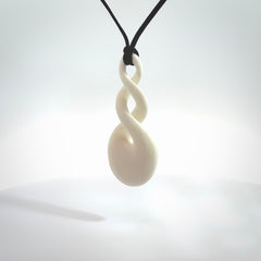 These are very cool, simple double twist pendants carved from natural bone. We have bound these in a black cord and will ship them to you wherever you are. Hand carved by NZ Pacific.