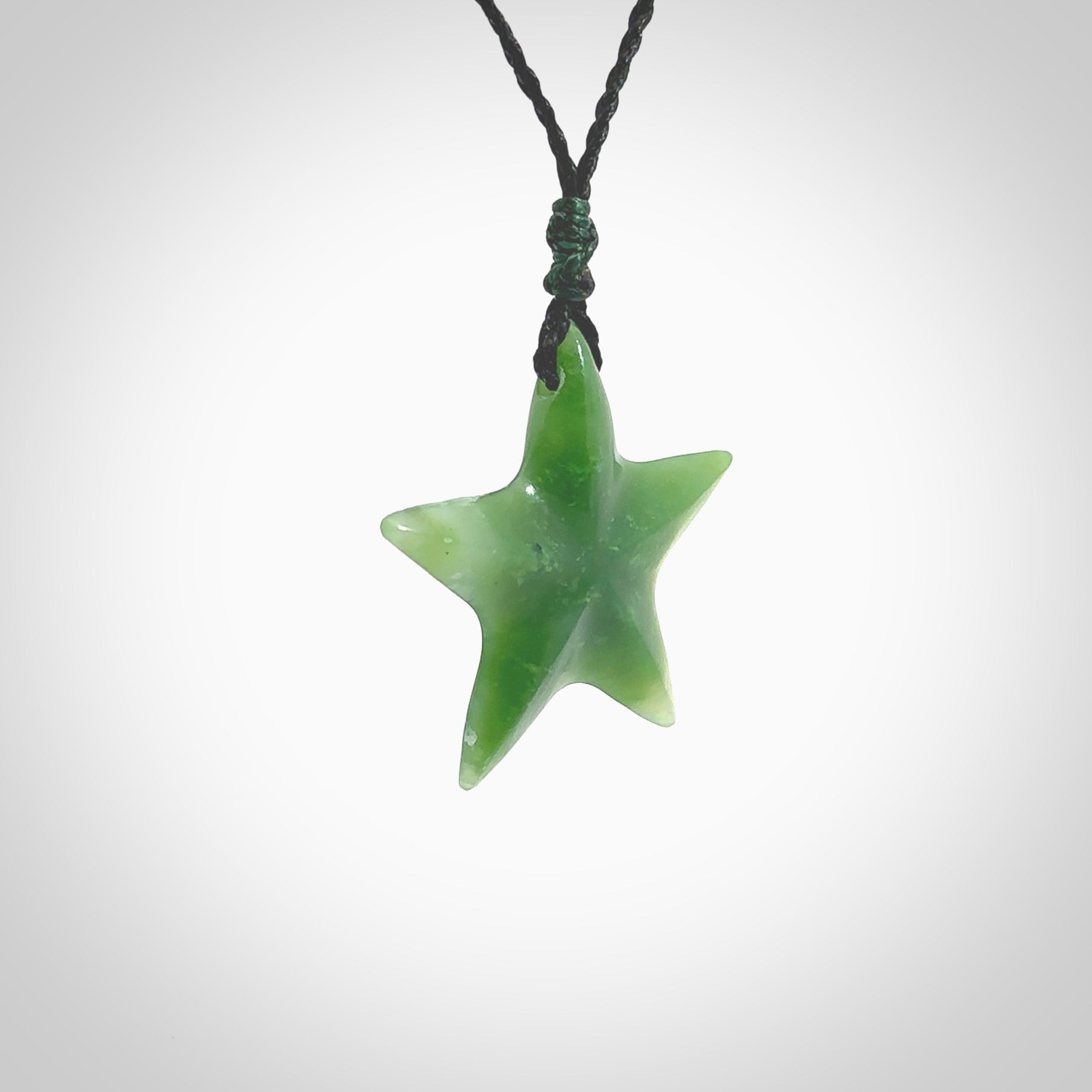 Hand made jade star pendant. Star shaped necklace hand made from Jade, delivered with Express Courier. We provide this pendant on an adjustable cord and packaged in a woven kete pouch.