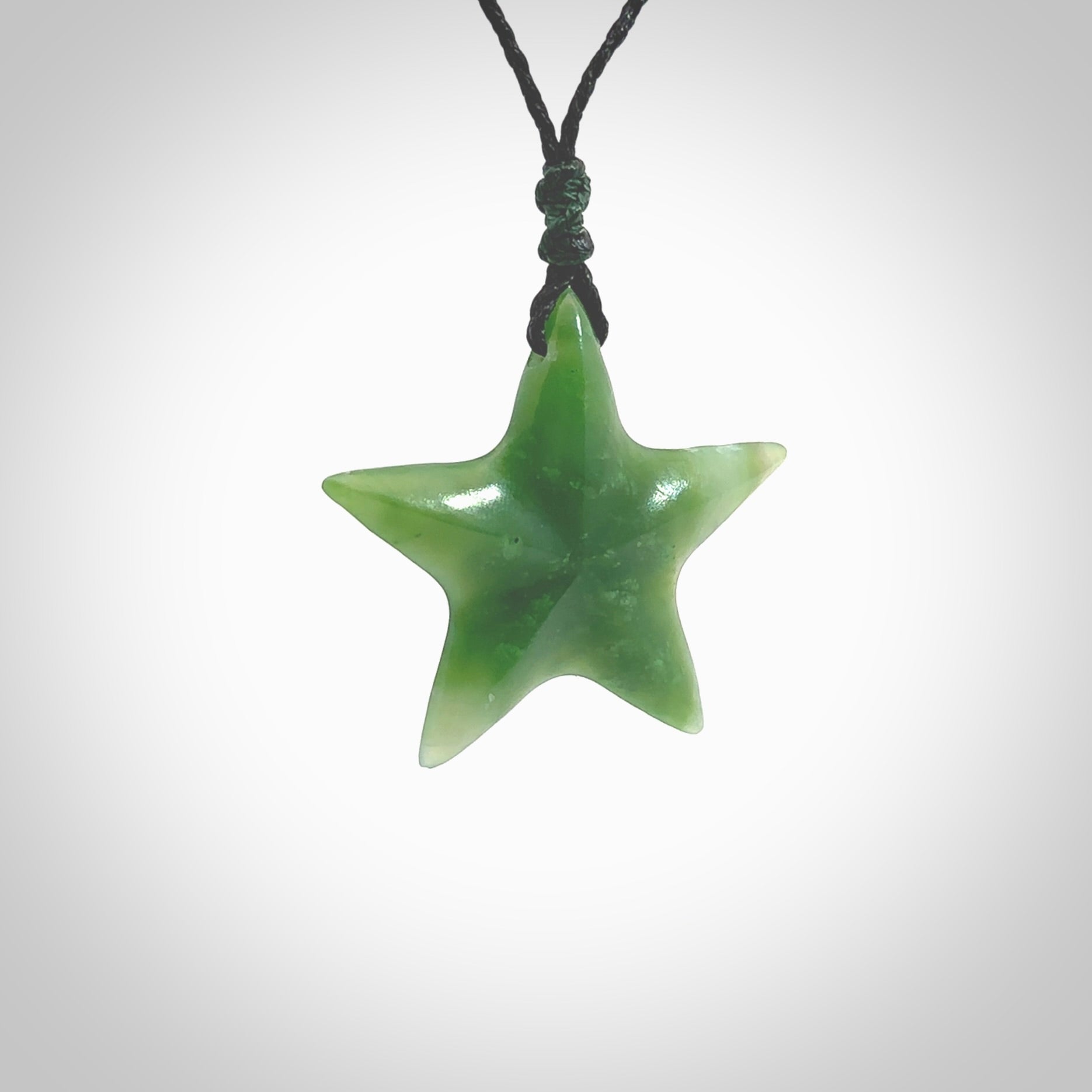 Hand made jade star pendant. Star shaped necklace hand made from Jade, delivered with Express Courier. We provide this pendant on an adjustable cord and packaged in a woven kete pouch.