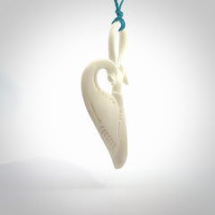 Hand carved large bone stingray pendant. Natural bone pendants from NZ Pacific. One only pendant provided with adjustable blue cord.