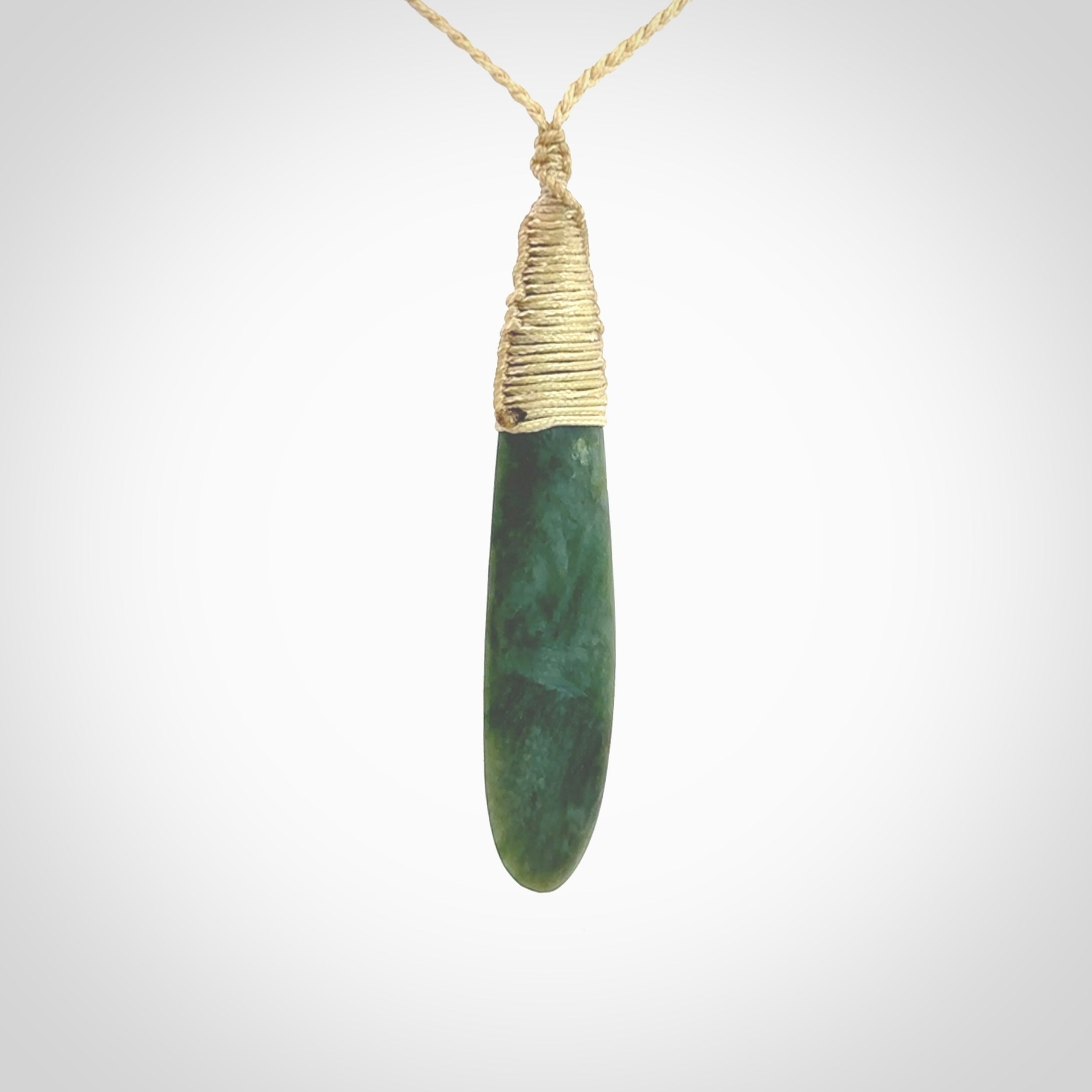 New Zealand flower jade drop pendant. Hand carved in New Zealand by NZ Pacific. Large New Zealand Jade roimata drop necklace. Drop pendant representing healing, comfort and compassion. Unisex pendants for lovers of Jade art to wear.