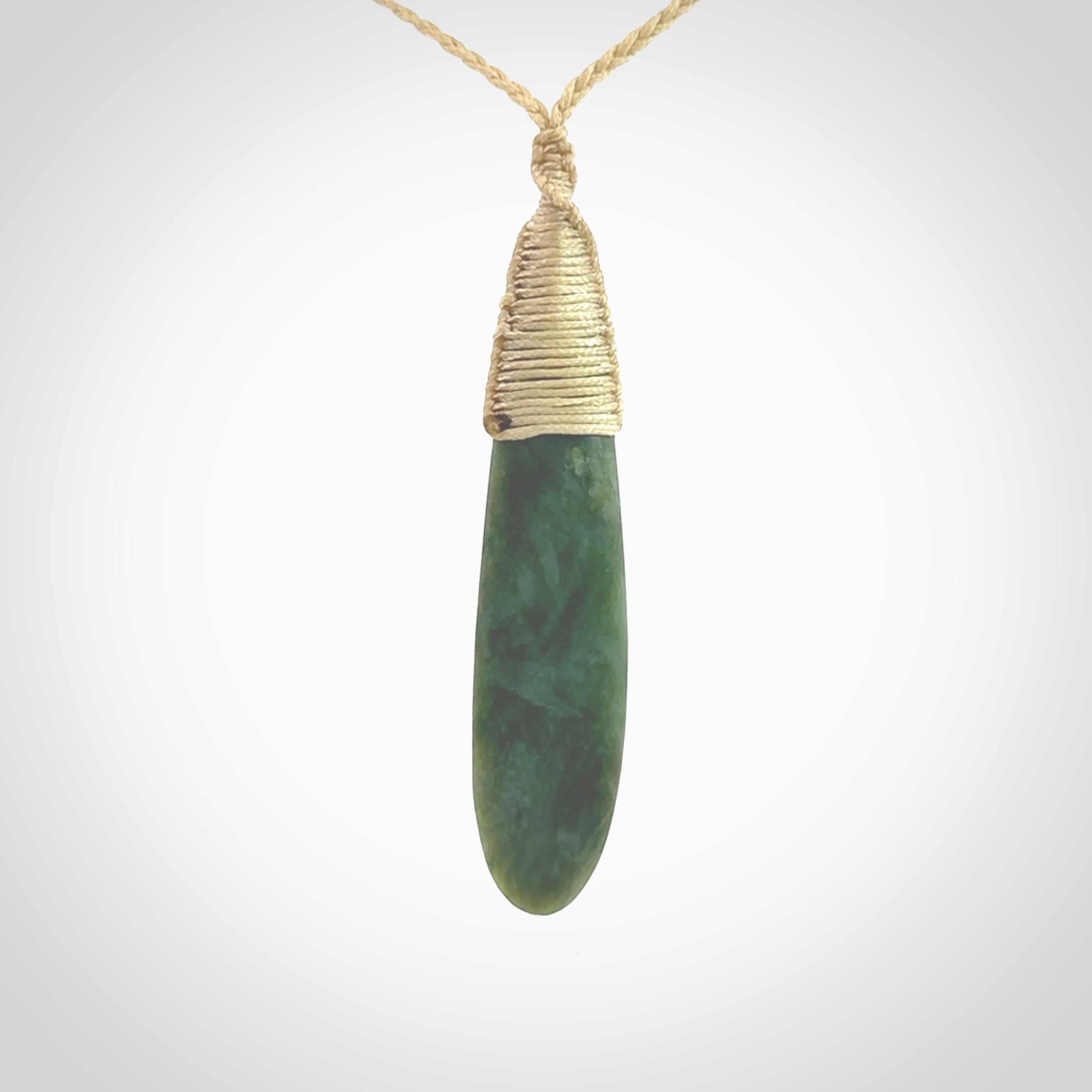 New Zealand flower jade drop pendant. Hand carved in New Zealand by NZ Pacific. Large New Zealand Jade roimata drop necklace. Drop pendant representing healing, comfort and compassion. Unisex pendants for lovers of Jade art to wear.