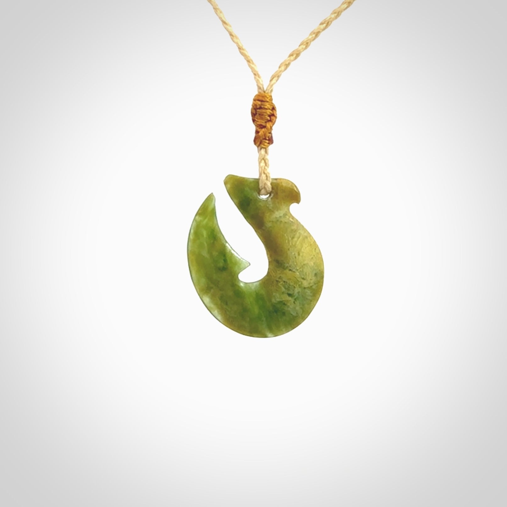 Hand carved New Zealand Jade Hook Pendant. Hand made Jade Hook, matau necklace provided with adjustable cord.