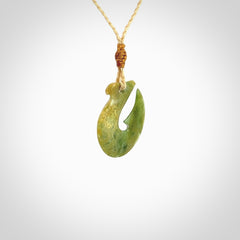 Hand carved New Zealand Jade Hook Pendant. Hand made Jade Hook, matau necklace provided with adjustable cord.