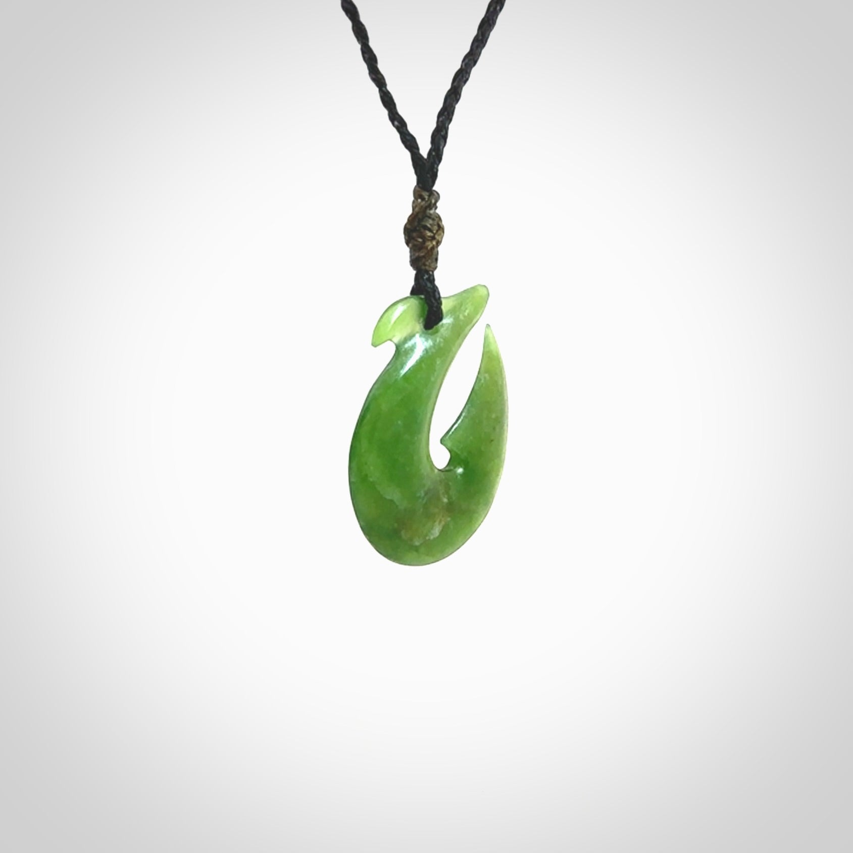 Hand carved New Zealand Jade Hook Pendant. Hand made Jade Hook, matau necklace provided with adjustable cord.