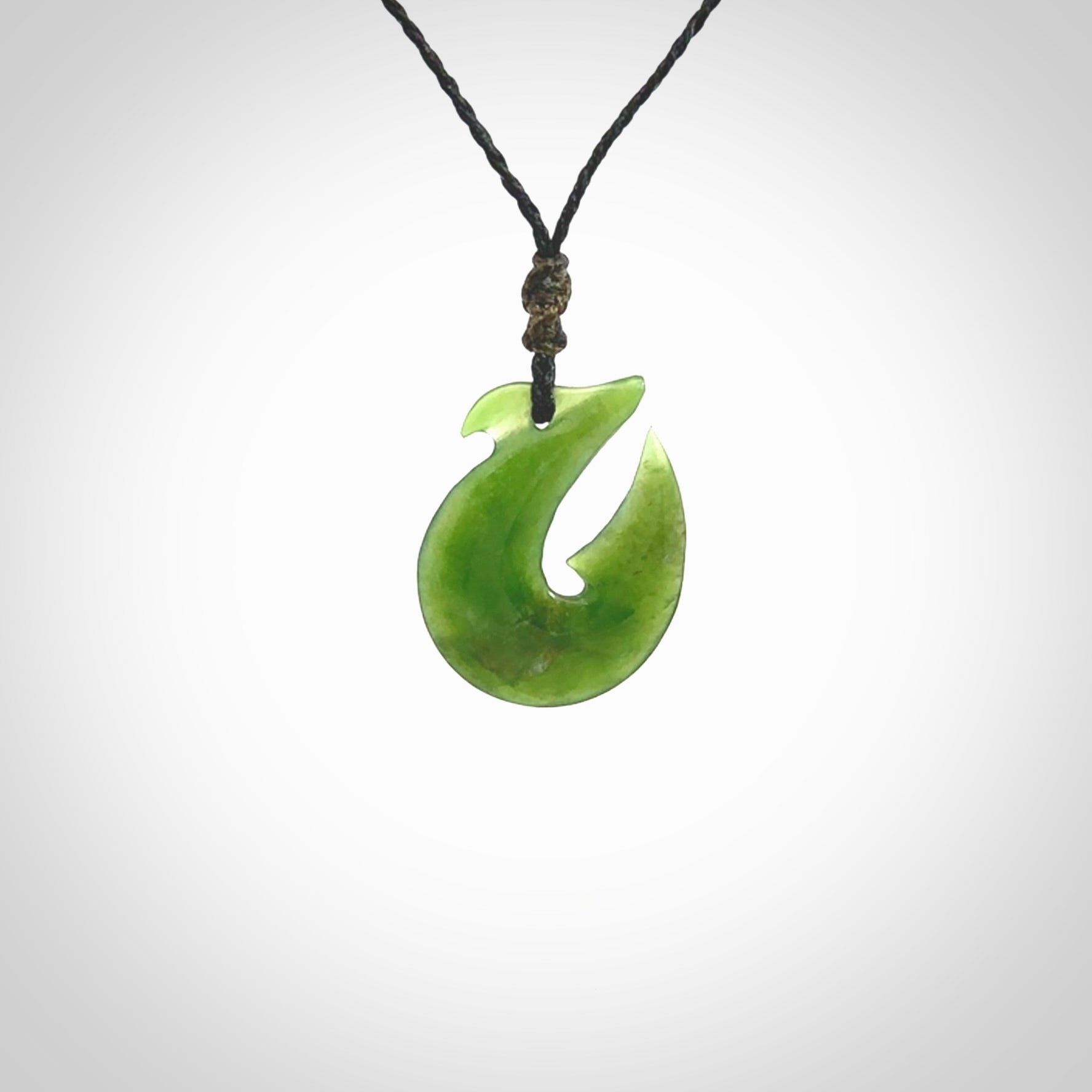 Hand carved New Zealand Jade Hook Pendant. Hand made Jade Hook, matau necklace provided with adjustable cord.