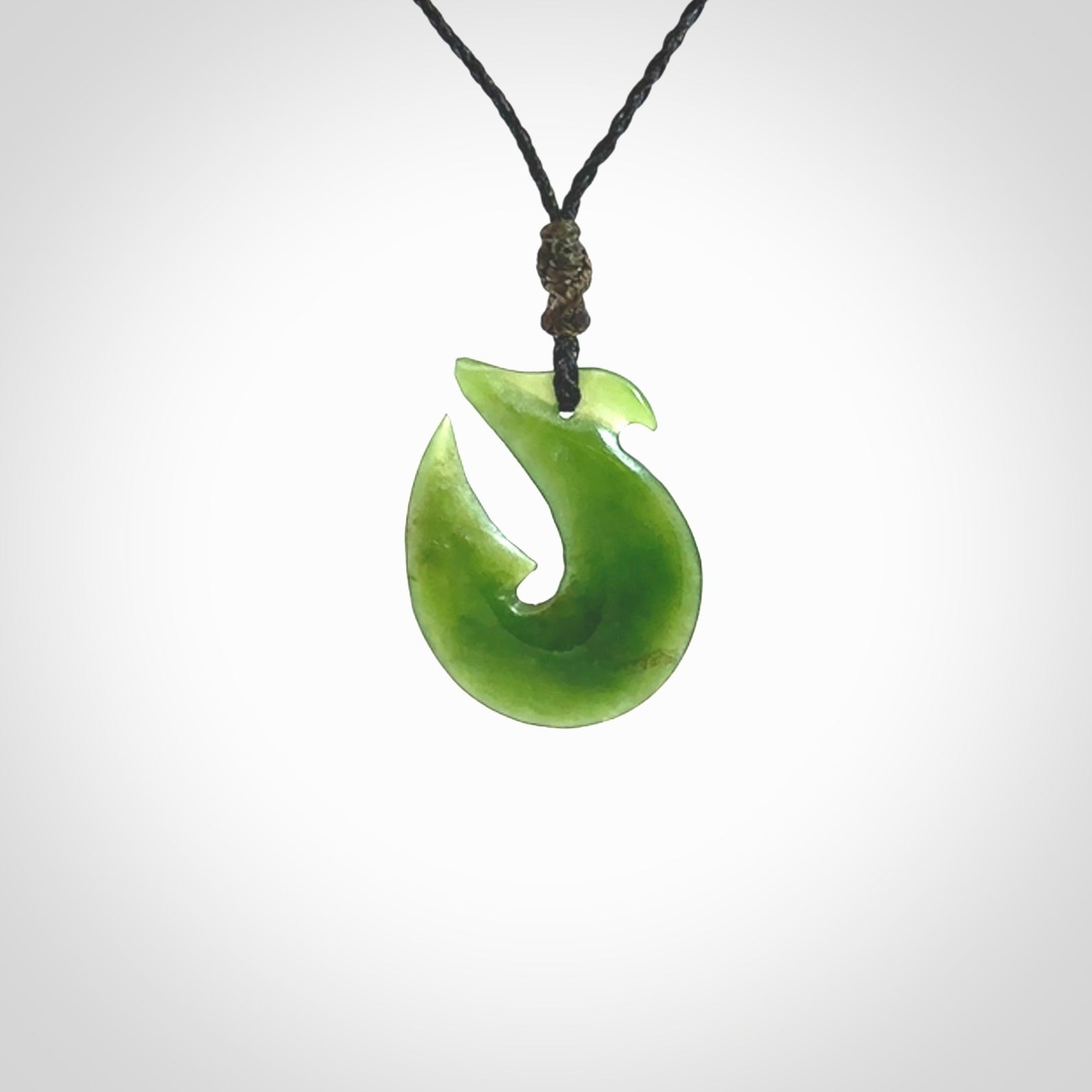 Hand carved New Zealand Jade Hook Pendant. Hand made Jade Hook, matau necklace provided with adjustable cord.