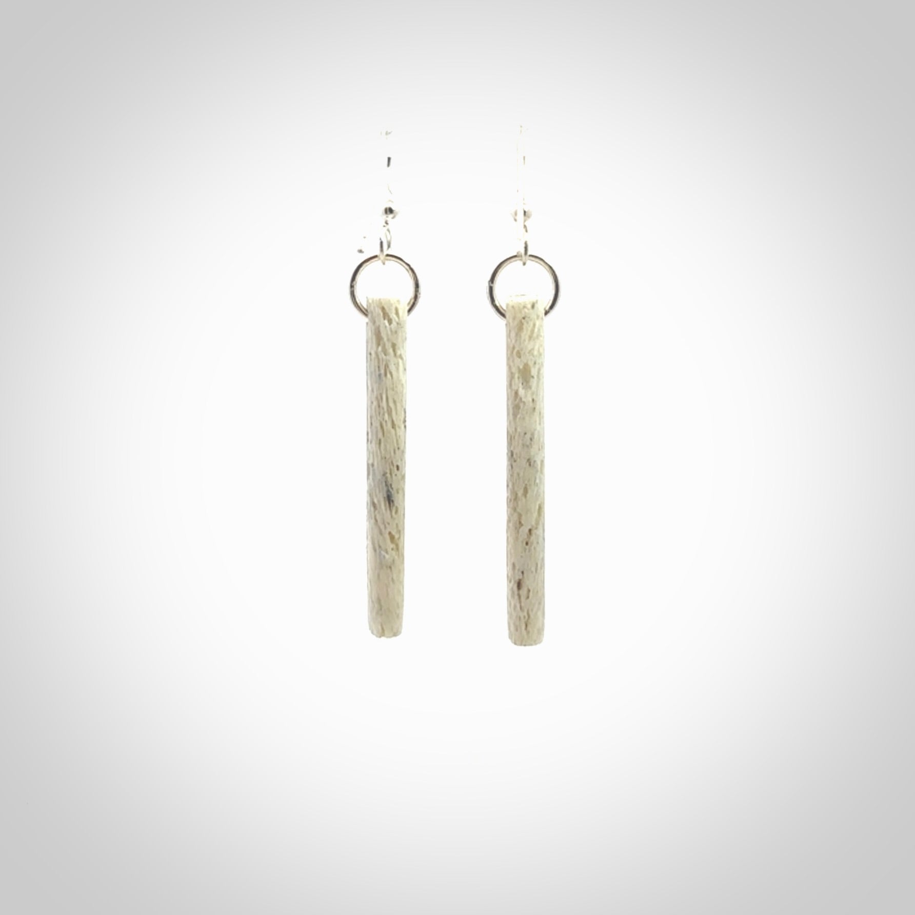 Hand carved large whalebone drop earrings hand made by Kristal Thompson. One only large whale bone drop earrings. Real whale bone art to wear. Free Shipping worldwide. One pair only, delivered in a kete pouch.