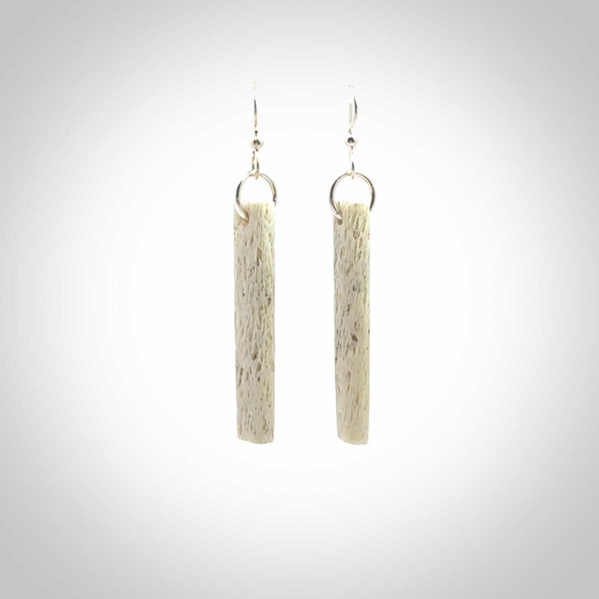 Hand carved large whalebone drop earrings hand made by Kristal Thompson. One only large whale bone drop earrings. Real whale bone art to wear. Free Shipping worldwide. One pair only, delivered in a kete pouch.