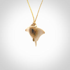 Woolly mammoth tusk manta ray pendant. Hand carved Mammoth Tusk manta ray pendant. Provided with adjustable cord.